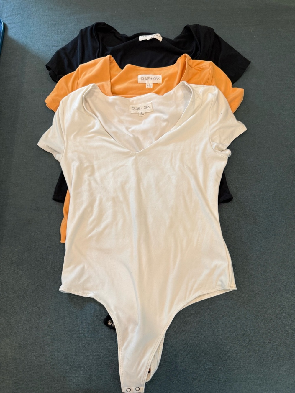 Olive & Oak White, Orange and Black V-Neck Bodysuits - Trio